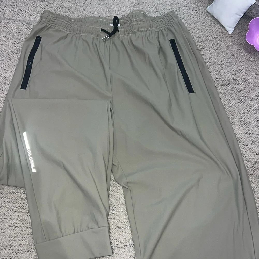Beige Athletic Joggers with Black Accents